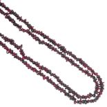 A selection of three garnet bead single-row necklaces. Lengths 86 to 56cms.