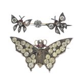 Two early 20th century paste brooches, the first a German silver gilt brooch designed as a centrally