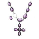 A set of paste jewellery, to include a purple paste necklace, suspending a similarly-set cross