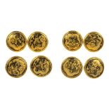 A set of eight Japanese dragon buttons, each designed as a three-clawed dragon, holding a pearl of