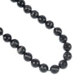 An agate bead single-row necklace, designed as a series of faceted circular banded agate beads, each