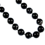 A banded agate necklace, designed as slightly graduated spherical banded agate beads measuring 1.6