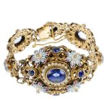 An Austro-Hungarian enamel and gem-set bracelet, of openwork design, the central panel of