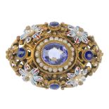 An Austro-Hungarian enamel and gem-set brooch, of floral openwork design, the oval-shape synthetic