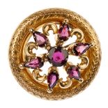 A late 19th century 9ct gold garnet brooch. Of openwork design, the pear and circular-shape garnet