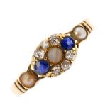 A late Victorian 18ct gold diamond, sapphire and split pearl cluster ring. The split pearl, within