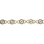 A 9ct gold bracelet and a pair of 9ct gold colour treated diamond earrings. The bracelet designed as