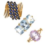 A selection of gem-set rings. To include a 9ct gold cushion-shape blue topaz three-stone ring, a 9ct