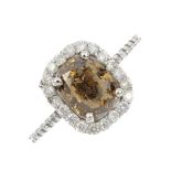 (172547) A 'yellowish brown' diamond and diamond dress ring. The fancy dark yellowish brown diamond,