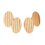 A pair of early 20th century 9ct gold cufflinks. Each designed as two oval-shape panels, with