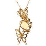 A 14ct gold opal pendant.  Of openwork design, the pear-shape opal cabochon, with butterfly sides,