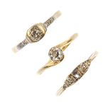 A group of three early 20th century platinum and 18ct gold diamond rings. To include an old-cut