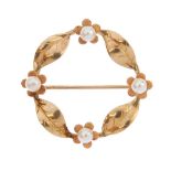 A selection of three brooches. To include a 9ct gold cultured pearl wreath brooch, a 9ct gold