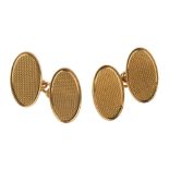 Two pairs of early to mid 20th century 9ct gold cufflinks. To include a pair of oval-shape