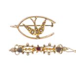 Two early 20th century 9ct gold brooches. The first designed as a split pearl swallow brooch