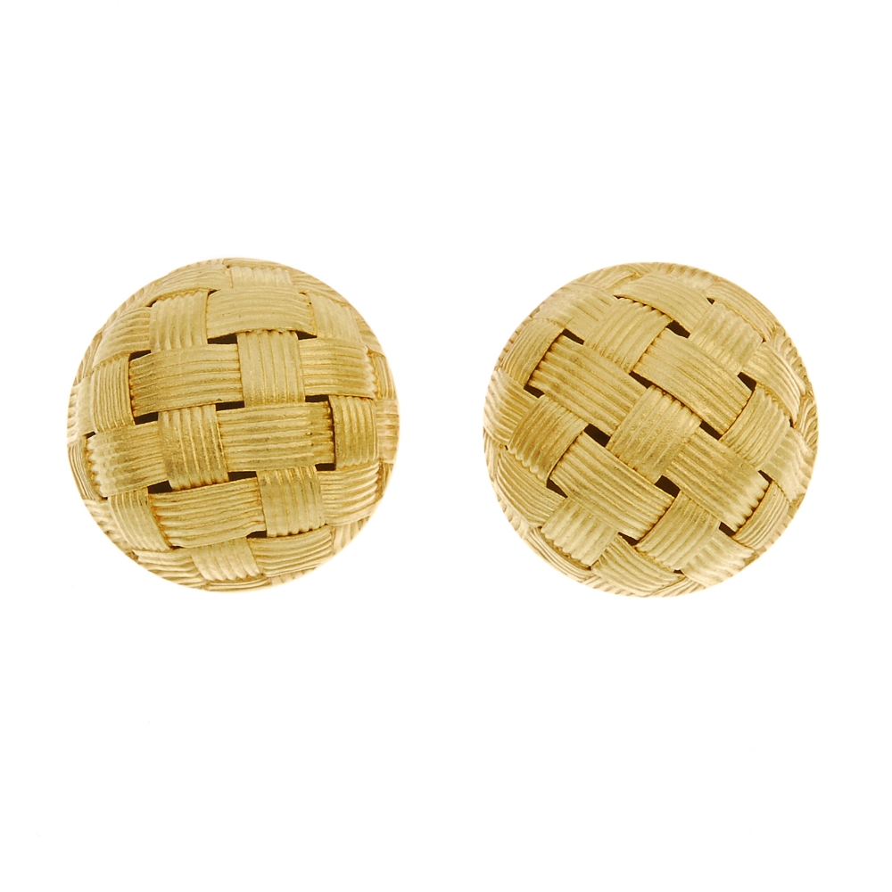 A pair of 18ct gold ear studs. Each designed as a domed woven panel. Import marks for Birmingham,