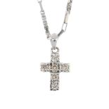 A diamond cross pendant. The brilliant-cut diamond cross, suspended from a fancy-link chain. Total