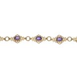 Two gem-set bracelets. To include a peridot and diamond bracelet and a 9ct gold amethyst scroll