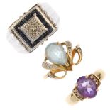 A selection of three gold gem-set rings. To include a 14ct gold blue topaz and diamond dress ring, a