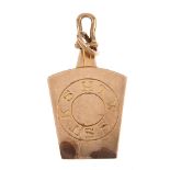 An early 20th century 9ct gold Masonic keystone pendant. The tapered panel, with engraved 'HTWSSTKS'