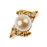 A cultured pearl and diamond dress ring. The cultured pearl, measuring 7.8mms, to the brilliant-