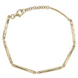A 9ct gold diamond bracelet. Designed as a series of brilliant-cut diamond accent curved links, to