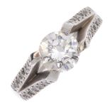 (167317) A fracture-filled diamond dress ring. The brilliant-cut diamond, to the brilliant-cut