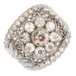 (126643) A diamond cocktail ring. Of openwork design, the old-cut diamond collet cluster, to the