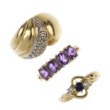 A selection of three 9ct gold gem-set rings. To include a single-cut diamond and grooved dress ring,