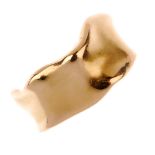 A dress ring. Of abstract design, with undulating sides. Ring size Q. Weight 4.9gms.  Overall