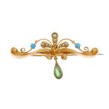 An Edwardian 15ct gold turquoise, split pearl and tourmaline brooch. The split pearl and circular