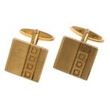 A pair of 1970s 9ct gold cufflinks. Each designed as a square-shape panel with geometric motif, to