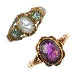 A selection of three gem-set rings. To include two oval-shape amethyst rings, each with scalloped