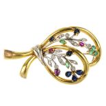 An 18ct gold diamond and gem-set brooch. Of openwork design, the sapphire, emerald, ruby and diamond