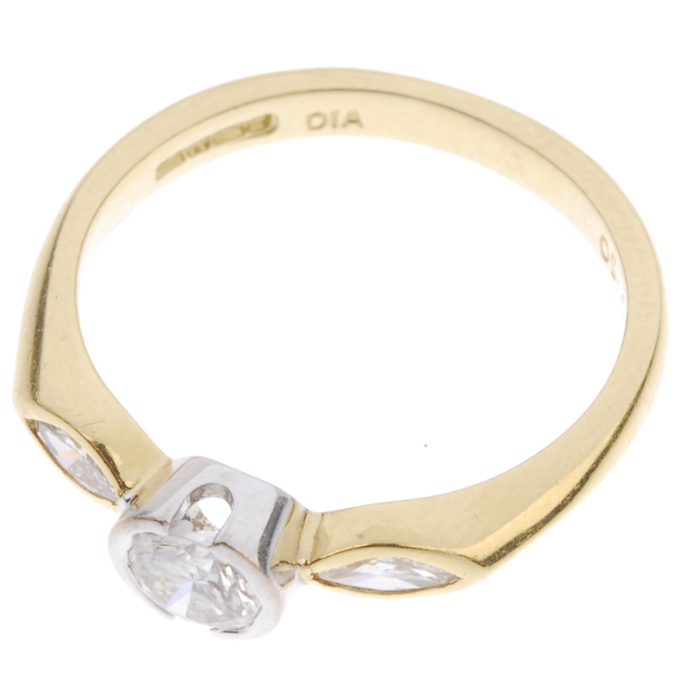 An 18ct gold diamond single-stone ring. The brilliant-cut diamond, within a partial collet - Image 2 of 2