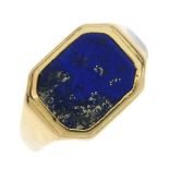 A gentleman's lapis lazuli dress ring. The rectangular-shape lapis lazuli collet, to the tapered