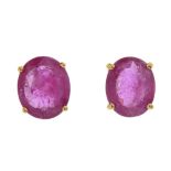 A pair of 18ct gold oval-shape glass-filled ruby single-stone ear studs. Hallmarks for Birmingham,