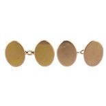 Two pairs of early 20th century 9ct gold cufflinks. The first of oval outline, the second of