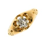 A late Victorian 18ct gold diamond single-stone ring. The old-cut diamond, within an extended claw