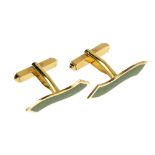 A pair of 18ct gold enamel cufflinks. Each designed as a green enamel curved line, to the hinged