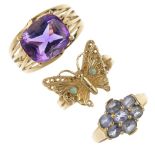 A selection of three gem-set dress rings. To include a 9ct gold cushion-shape amethyst woven ring, a