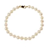 A cultured pearl single-strand necklace and bracelet. Each comprising a single row of cultured