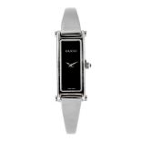 GUCCI - a lady's 1500L bracelet watch. Numbered 1315090. Signed quartz movement. Black dial.