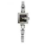 GUCCI - a lady's G Mini bracelet watch. Reference 102, serial 10223392. Signed quartz movement.