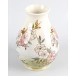 A William Moorcroft vase, of pear form with short flared neck, decorated with apple blossom