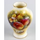 A small Royal Worcester porcelain vase hand painted by George Moseley. The balustroid body with gilt