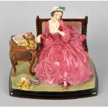 A Royal Doulton bone china figurine, 'Jasmine' HN1863, 7.25 (18.5cm) high. Several cracks to base