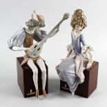 Two Lladro figures, the first modelled as a male musician with feathered cap, the other as female