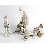 A Lladro porcelain figure, modelled as a seated aged gentleman feeding a dog, 10.5 (26.75cm) high,