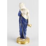 A Royal Worcester figure, 'Sorrow', modelled as a blue robed female clutching dove on circular base,